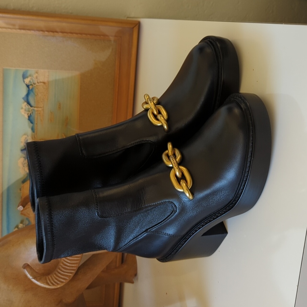 Coach Black Heeled Boots with Gold Chain Accent